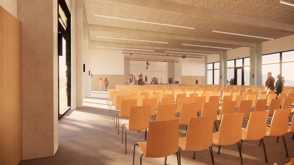 Innenansicht der Aula mit Bestuhlung des Neubaus der Katharina- Henoth-Gesamtschule