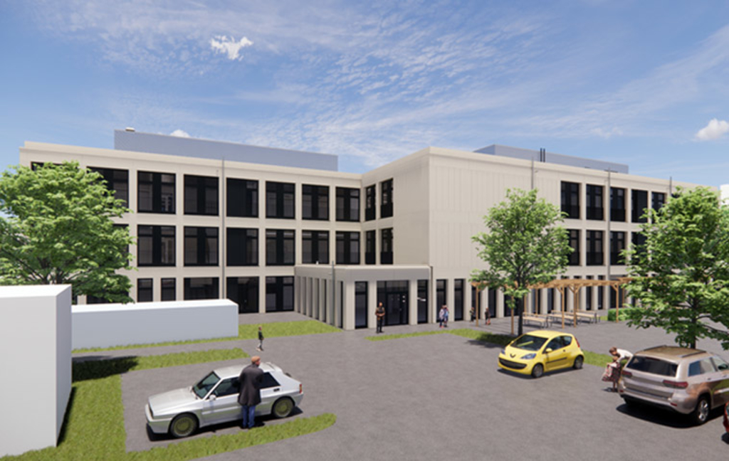 Visualisierung der neuen Grundschule mit begrüntem Flachdach, Aufenthaltsbereichen im Freien sowie Parkflächen