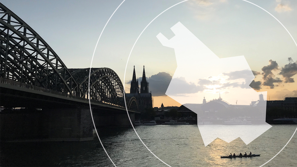 Blick über den Rhein zum Kölner Dom mit Stadtkarte in der rechten Bildseite., Link auf Eine Stadtstrategie mit zwei Perspektiven - Stadt Köln