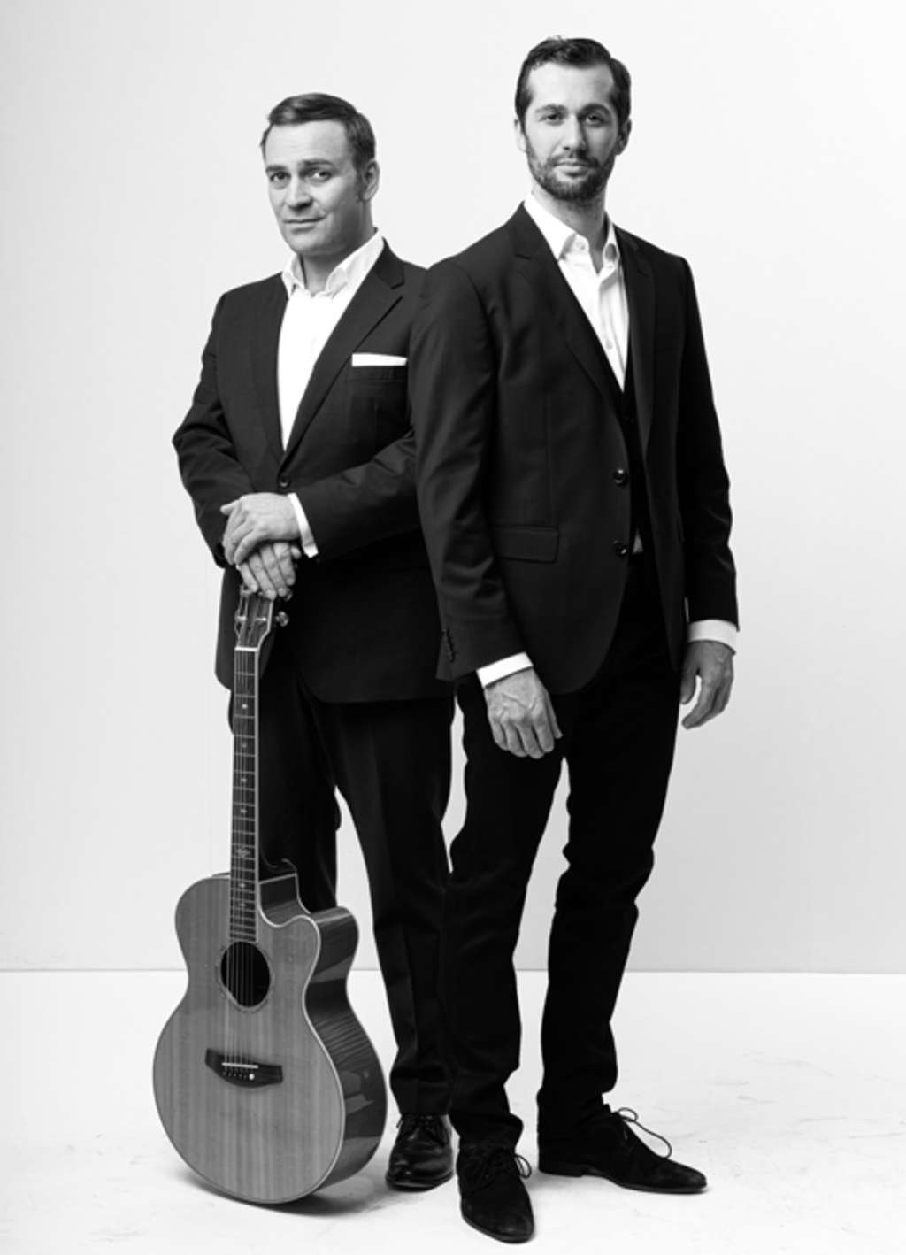 Leonhardsberger und Schmid, zwei Männer im Anzug