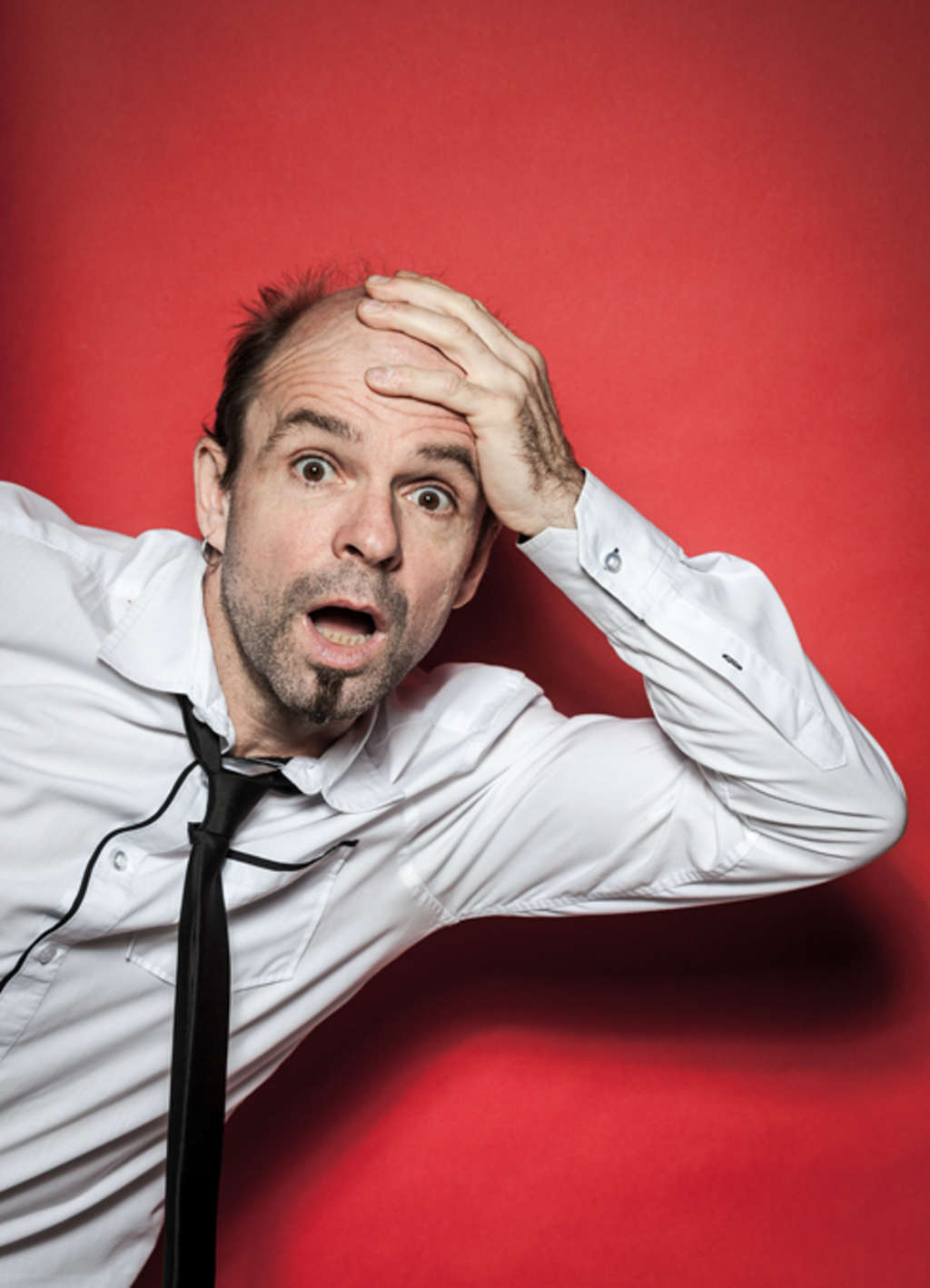 Seibel -  Mann in weißem Hemd, guckt erstaunt