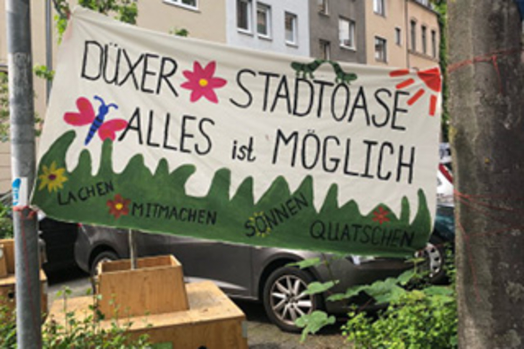 Foto von Schild "Düxer Stadtoase - Alles ist Möglich"