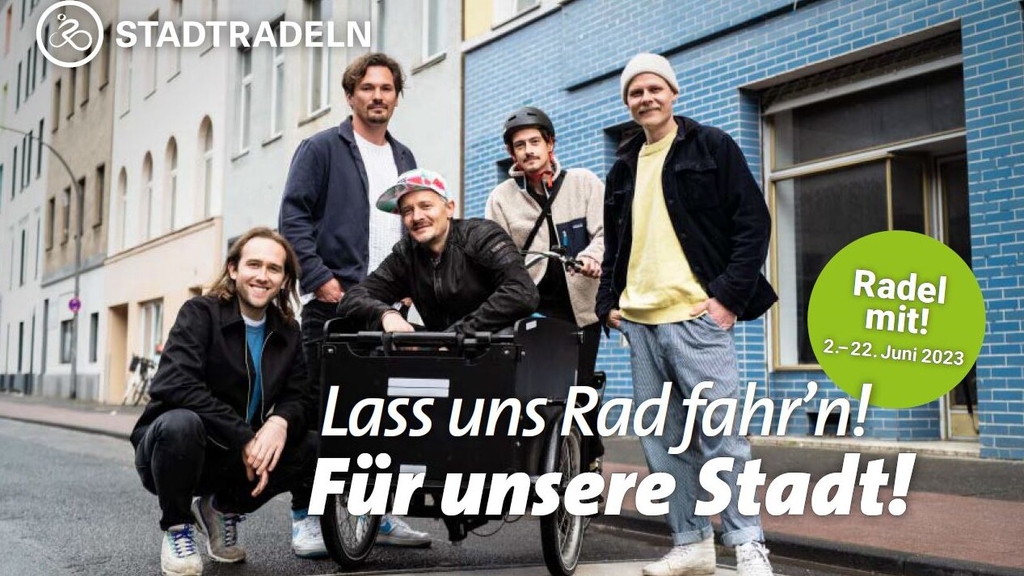 Kölschrockband Cat Ballou. Zu sehen sind die fünf Bandmitglieder mit einem Lastenrad auf einer Fahrradstraße. 